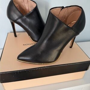 BCBG Black Leather Pointed Stiletto Ankle Booties with Gold Trim